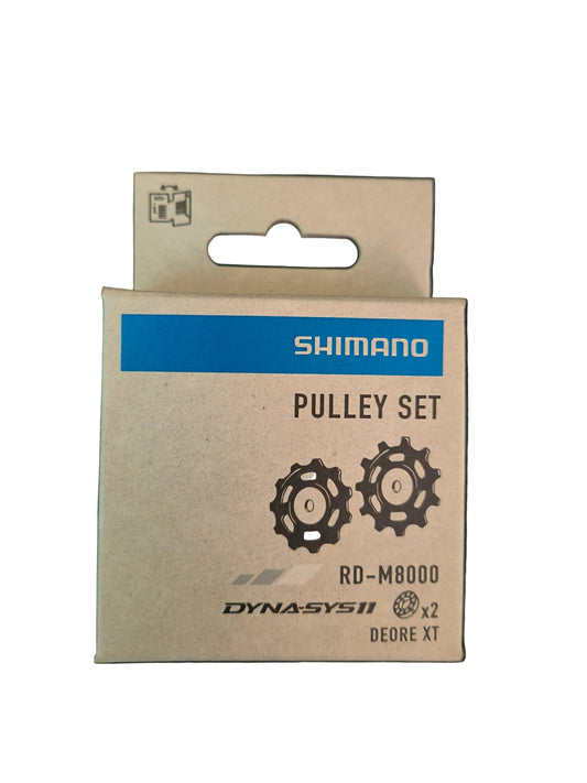 Shimano Deore XT RD-M8000 11-speed rear derailleur pulley set.